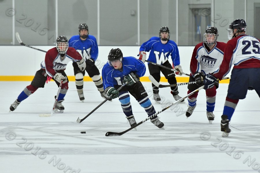 Wheaton College Men\'s Ice Hockey vs Middlesex Community College. - Photo By: KEITH NORDSTROM